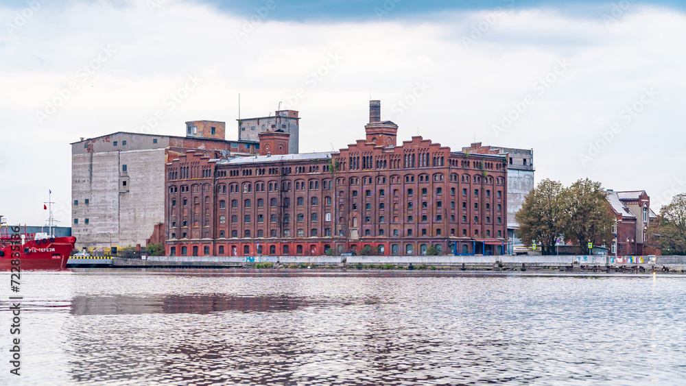 Obraz premium Pregolya river, Kaliningrad, Russia, 2023.09.22. Old grain elevator