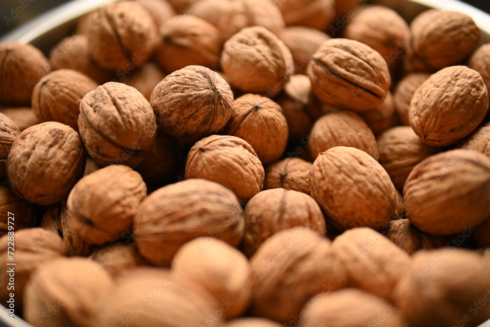 Top view of whole walnuts as background texture Top view of whole walnuts as background texture