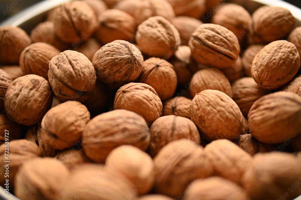 Top view of whole walnuts as background texture