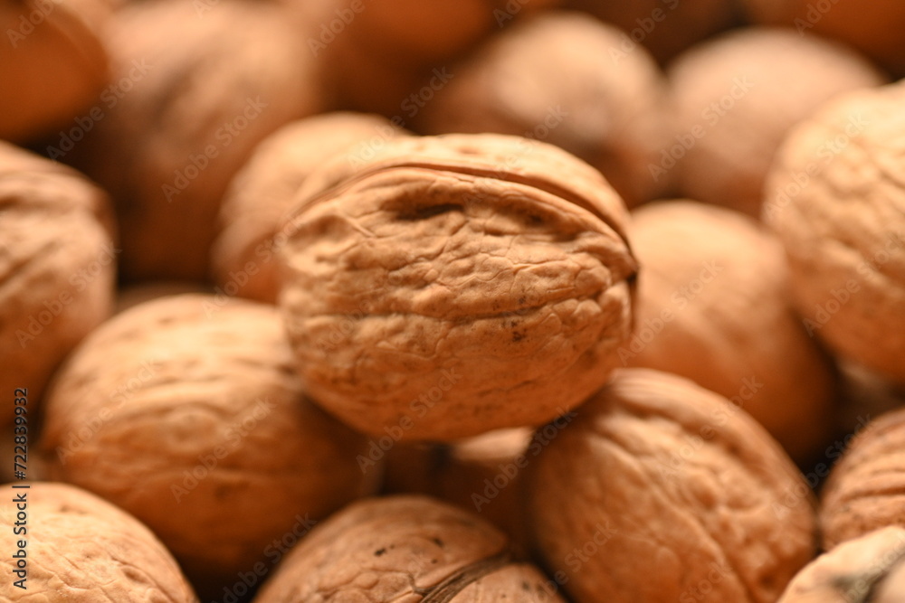 Top view of whole walnuts as background texture Top view of whole walnuts as background texture