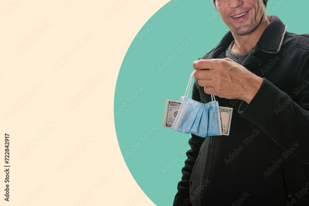 Smiling man holding money in medical mask because of lockdown crisis, Financial scrutiny: Man examines money bills in a close-up, navigating the nuances of payments. Smiling man holding money in medical mask because of lockdown crisis, Financial scrutiny: Man examines money bills in a close-up, navigating the nuances of payments.