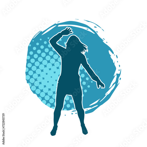 Silhouette of a slim female in dance pose. Silhouette of a woman dancing.