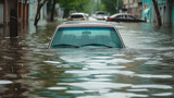 Urban flooding scene with a car submerged in water, showcasing the impact of heavy rains and climate change.
