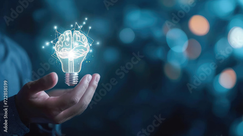 Businessman holding half of the virtual lightbulb and brain on blue bokeh background, Smart thinking idea and inspiration innovation concept  photo