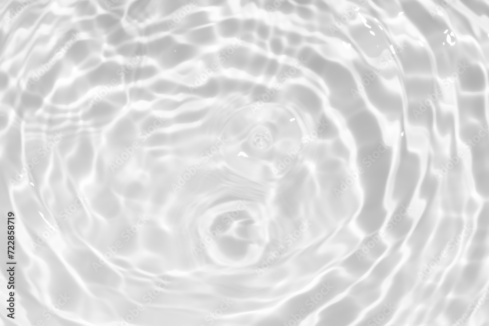 White water with ripples on the surface. Defocus blurred transparent white colored clear calm water surface texture with splashes and bubbles. Water waves with shining pattern texture background. White water with ripples on the surface. Defocus blurred transparent white colored clear calm water surface texture with splashes and bubbles. Water waves with shining pattern texture background.