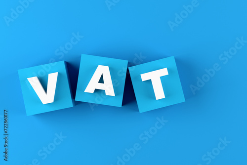Value added tax concept. The acronym VAT on blue cube blocks.