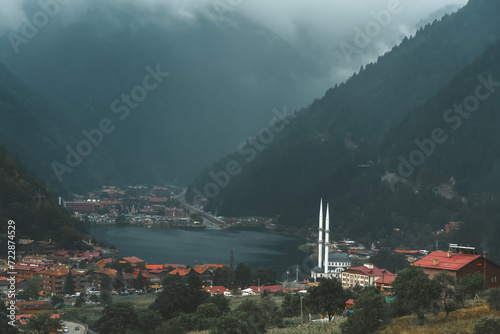 Beautiful view of Lake Uzungol and the surrounding area from the height of the mountains. One of the most beautiful tourist spots in Turkey. A popular summer vacation spot for locals and tourists. photo