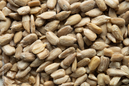 Close-up of a set of peeled raw sunflower seeds. Top view.