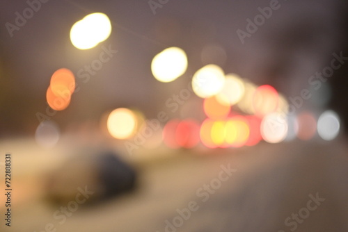 blurry night city  blurry night city road with cars  out of focus night city