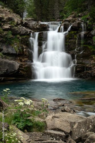 Fototapeta Naklejka Na Ścianę i Meble -  Gradas de Soaso (Soaso waterfalls) in the Ordesa Valley National Park in Aragon Pyrenees. Huesca, Spain. Ara river waterfalls.