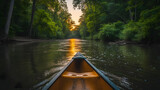 A canoe on a tranquil river, with lush forests on either side as the background, during a peaceful summer evening