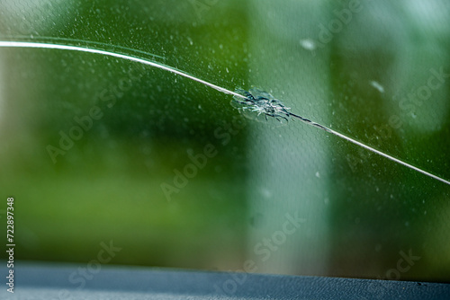 car window - cracked - stone - chip from the road