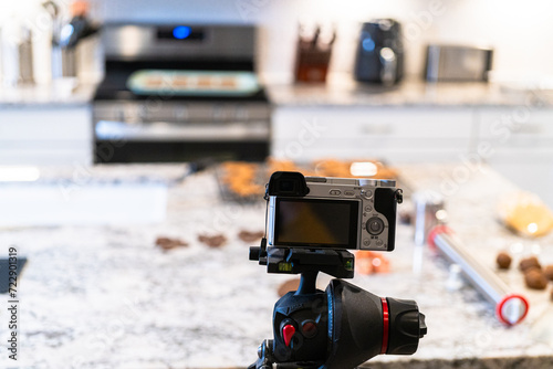 Recording Video with DSLR Camera in Modern Kitchen