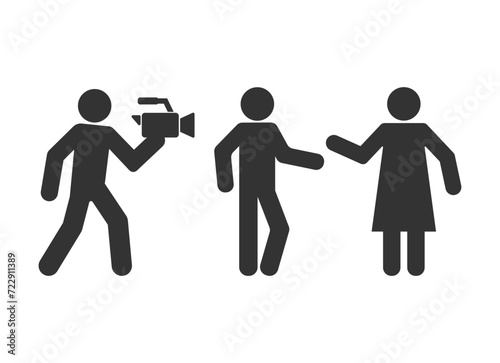 cameraman with video camera recording couple