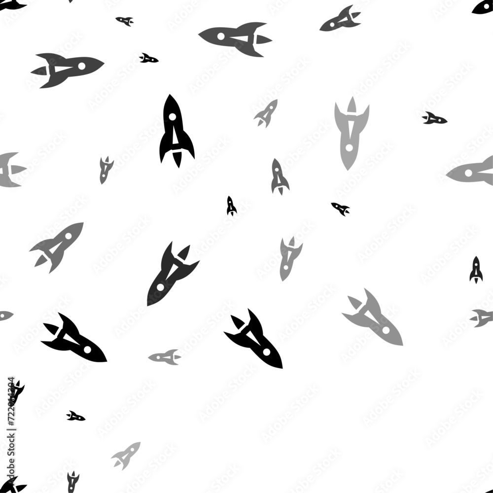 Seamless vector pattern with rockets, creating a creative monochrome background with rotated elements. Vector illustration on white background Seamless vector pattern with rockets, creating a creative monochrome background with rotated elements. Vector illustration on white background