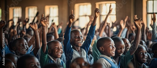 Happy students at a school in Uganda Africa Students raising their hands. Creative Banner. Copyspace image