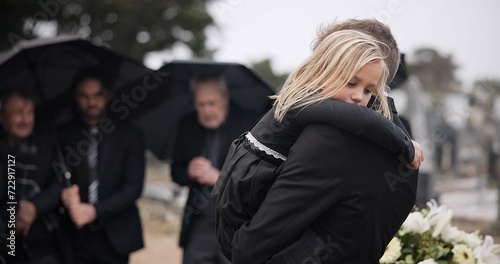Obraz na plátne Sad, hug and a father and child at a funeral with depression and mourning at the graveyard