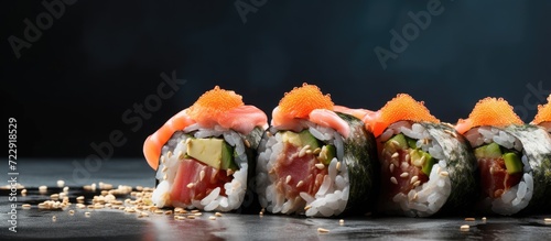Homemade futomaki maki sushi roll with tuna fish paste Table spin. Creative Banner. Copyspace image photo