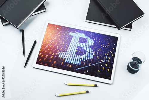 Top view of modern digital tablet screen with creative Bitcoin symbol hologram. Mining and blockchain concept. 3D Rendering