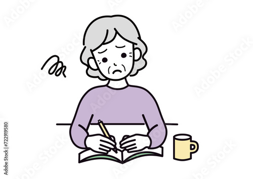 勉強するシニア女性