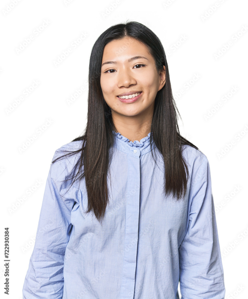 Young Chinese woman in blue shirt happy, smiling and cheerful. Young Chinese woman in blue shirt happy, smiling and cheerful.