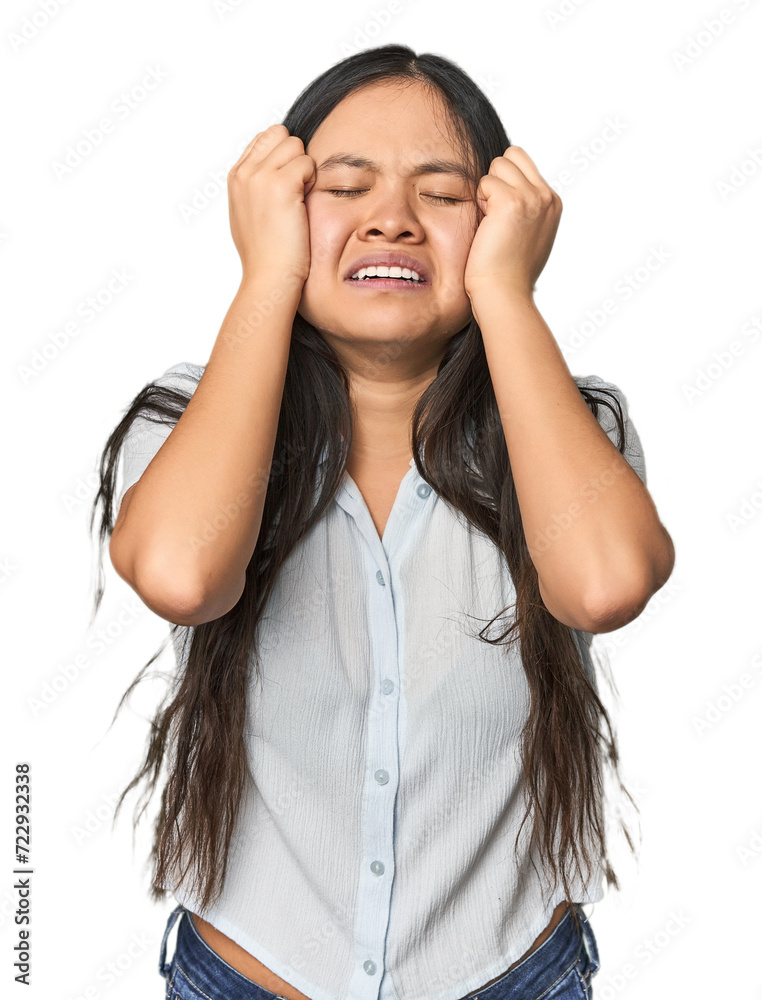 Young chinese woman isolated crying, unhappy with something, agony and confusion concept. Young chinese woman isolated crying, unhappy with something, agony and confusion concept.