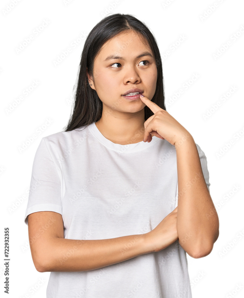 Young chinese woman isolated looking sideways with doubtful and skeptical expression. Young chinese woman isolated looking sideways with doubtful and skeptical expression.