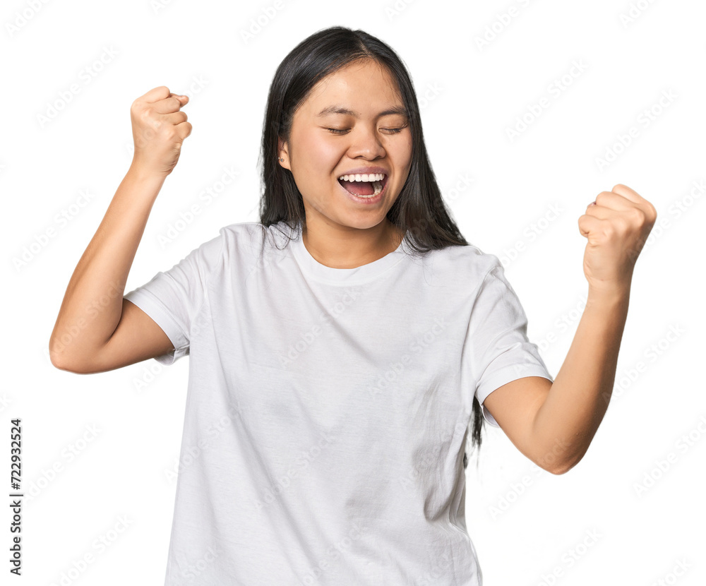 Young chinese woman isolated dancing and having fun. Young chinese woman isolated dancing and having fun.