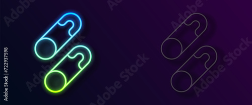 Glowing neon line Classic closed steel safety pin icon isolated on black background. Vector