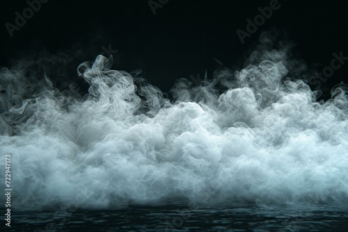 White smoke or vapor cloud on a dark background. Dry ice smoke. Chemical reaction. Magic trick. photo