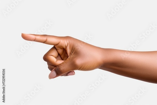 A person's hand pointing at an object or direction. Can be used to illustrate guidance, instruction, or emphasis in various contexts