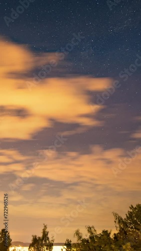 time lapse of the night sky stars and moon in the night sky