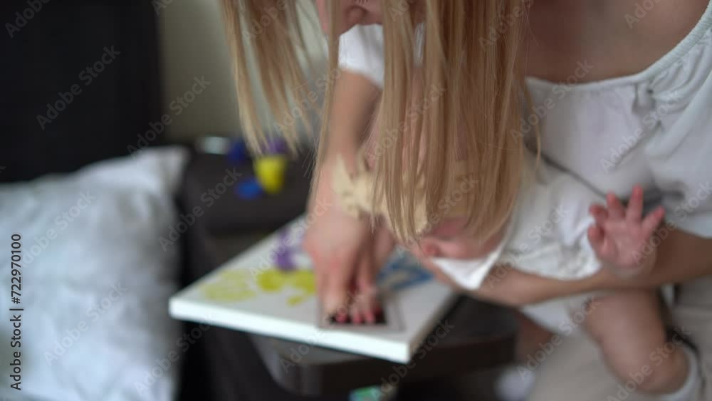 making a print of baby hand making a print of baby hand