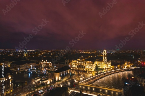 Midnight Majesty: A Captivating Aerial View of Oradea, Romanias Sparkling Cityscape at Night