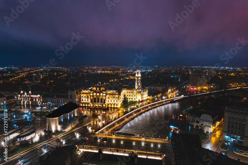 Midnight Symphony: Mesmerizing Aerial View of Oradea, Romanias Enchanting Cityscape Illuminated by Night Lights
