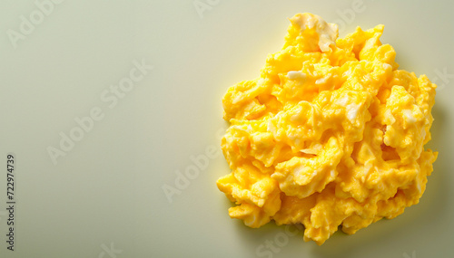 tasty scrambled egg on a clear background with copy space for text, top view photo