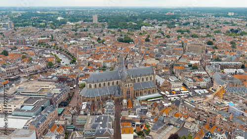 Haarlem, Netherlands. The Church of St. Bavo is a Gothic temple. Panoramic view of Haarlem city center. Cloudy weather during the day. Summer, Aerial View