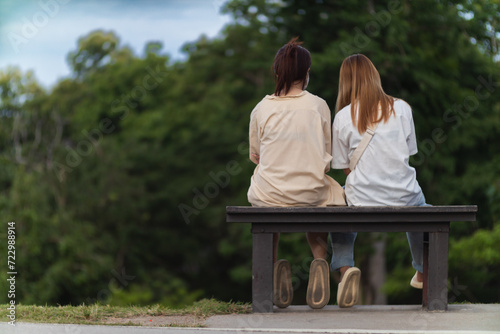 lgbtq couple sitting and talking openly and happily together demonstrate right and freedom lgbtq couples love each other. lgbtq couple having fun together in country where homosexuality not prohibited © thatinchan