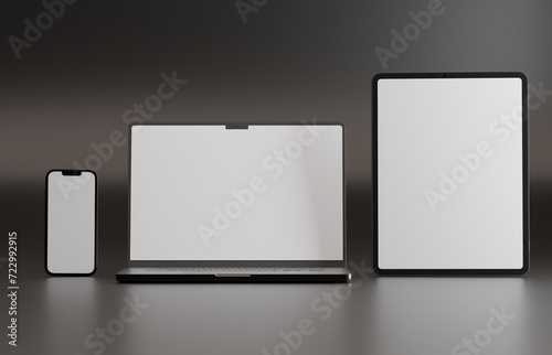 High end phone, tablet and laptop on black studio backdrop. Blank mockup template screen.	