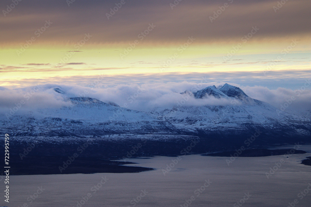 mountain panorama with clouds and snow