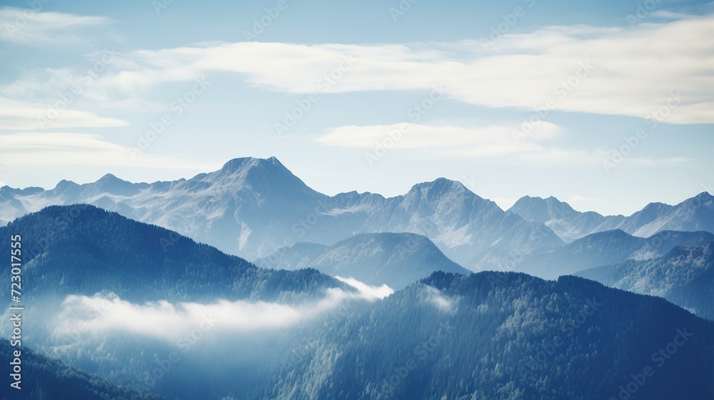 Mountain Landscape Covered with white clouds. Blurred Background.