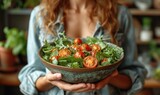 woman_eating_a_bowl_of_green_salad