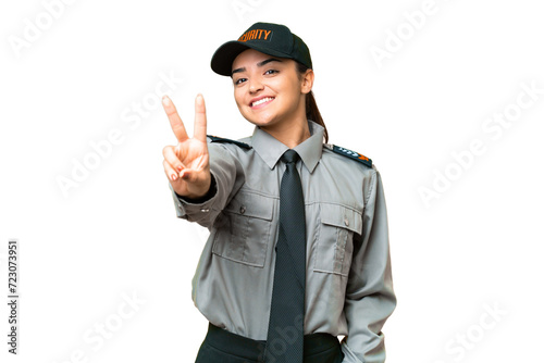 Young safeguard woman over isolated chroma key background smiling and showing victory sign