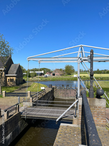 Canal lock and bridge at Ezumazijl photo