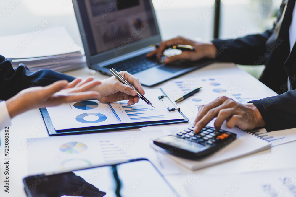 Business people meeting to discuss growth analysis of financial charts and business marketing graphs. Accounting, financial planning and investment. Business people meeting to discuss growth analysis of financial charts and business marketing graphs. Accounting, financial planning and investment.