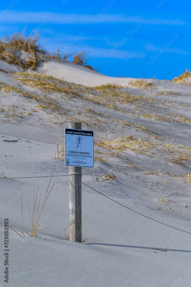 Warning information sign on sand dunes, Island Beach State Park, Long Beach Island, New Jersey