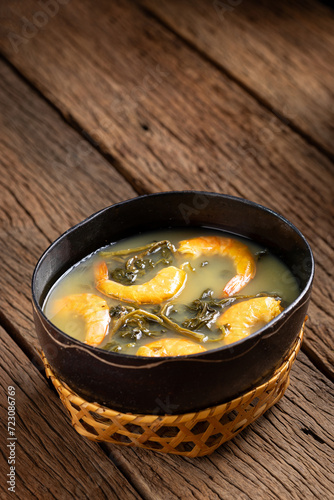 Tacacá, typical food from the Brazilian Amazon. Made with tucupi, jambu and shrimp. photo