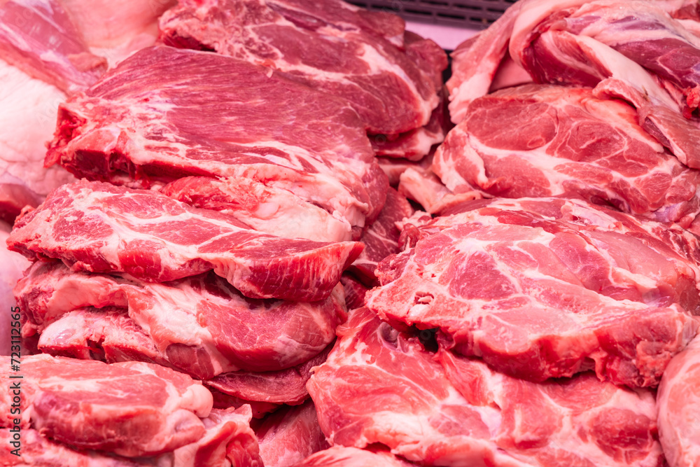 Close up of meat in a supermarket. Raw meat at butcher shop