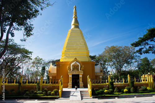 Chedi stupa containing relics of Luang Pu Dune Atulo of Wat Burapharam temple for thai people travelers travel visit respect praying blessing in Phanom Sawai Forest Park at Prasart in Surin, Thailand photo