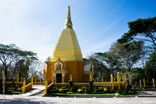 Chedi stupa containing relics of Luang Pu Dune Atulo of Wat Burapharam temple for thai people travelers travel visit respect praying blessing in Phanom Sawai Forest Park at Prasart in Surin, Thailand photo